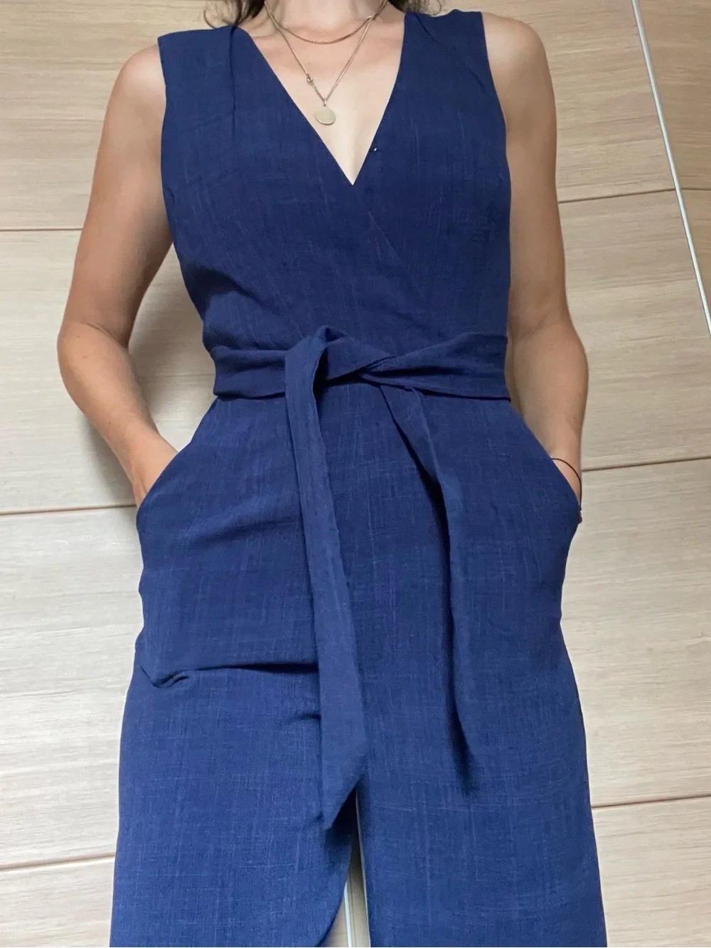 Adelyn Rae Navy Sleeveless Wrap Jumpsuit with Tie Waist - Picture 3 of 11
